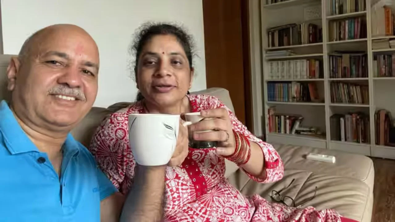 Share photo of him drinking tea with his wife