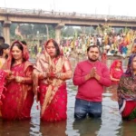 Arghya to the setting sun at Nalkari river ghat of Bhurkunda