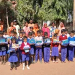 Distribution of clothes among the students of middle school Nayanagar