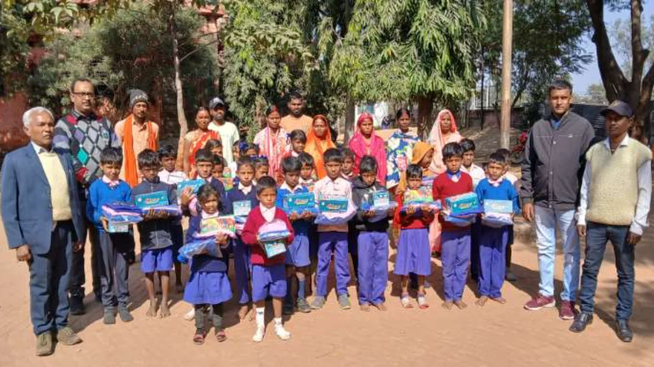 Distribution of clothes among the students of middle school Nayanagar